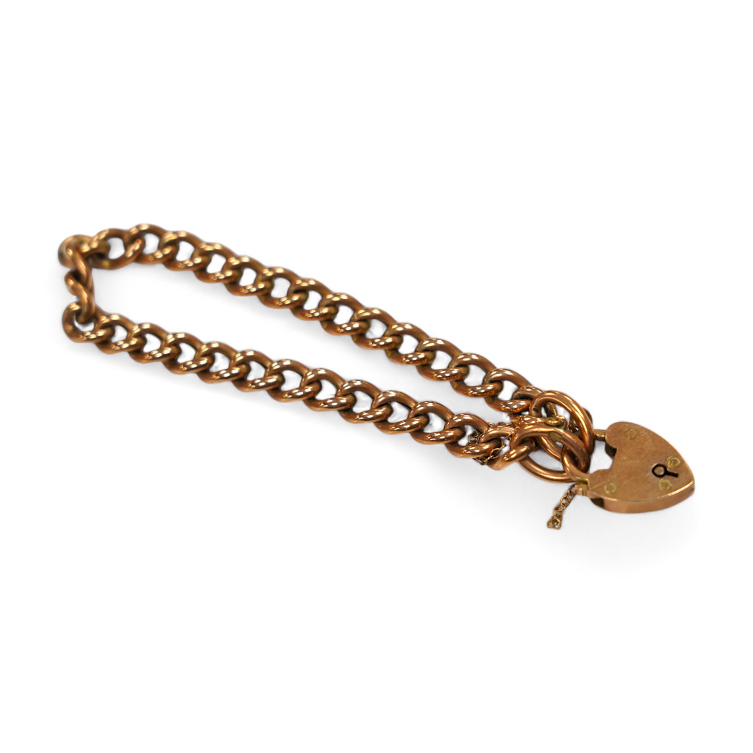 An Edwardian 9ct gold curb link bracelet, with heart shaped padlock clasp, 17cm, 10 grams. Condition - fair to good